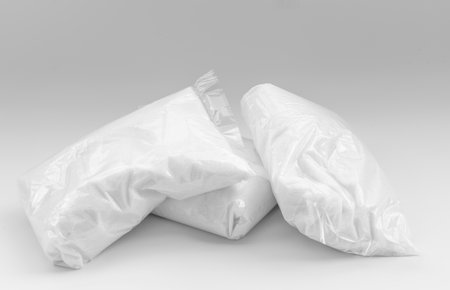 Sugar in packages on white backgroundの写真素材