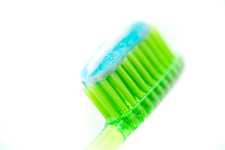 Toothbrush with paste on white backgroundの写真素材