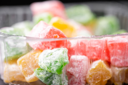 Packaged candies of different colors
