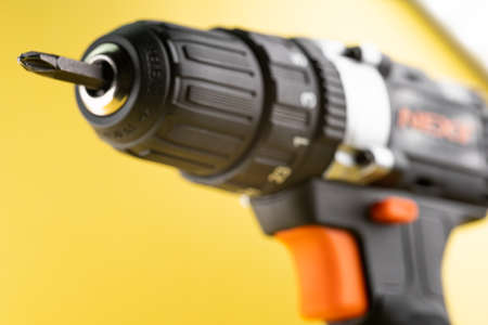 Drill and screwdriver with fixed bit