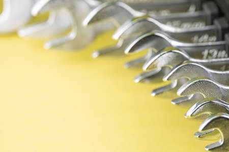 Wrenches of different diameters in a rowの写真素材