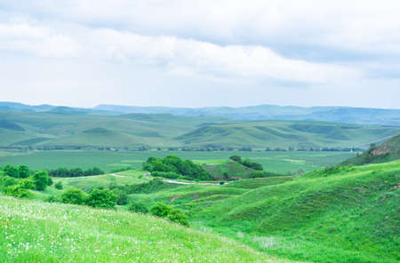 Mountains and plains in summerの写真素材