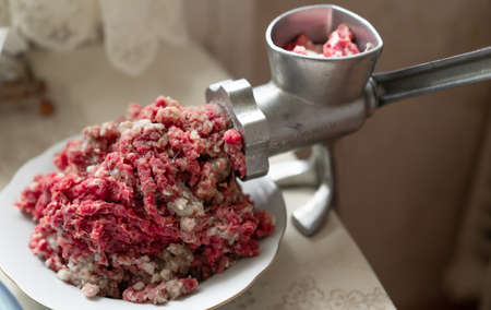 Minced meat cooked with a meat grinderの写真素材