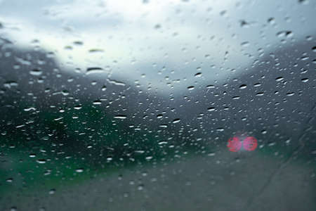 Raindrops on the glass of the carの写真素材