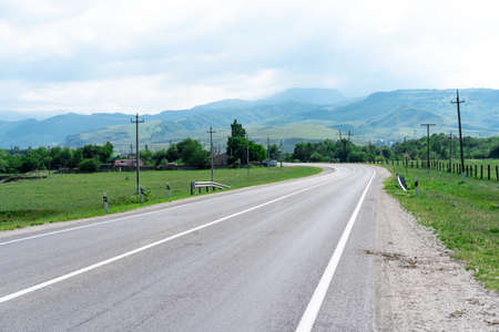 Turning road with markings for carsの写真素材