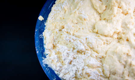Dough in a container for further bakingの写真素材