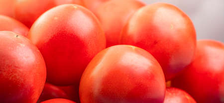 Ripe tomatoes as background or textureの写真素材