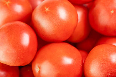 Ripe tomatoes as background or textureの写真素材