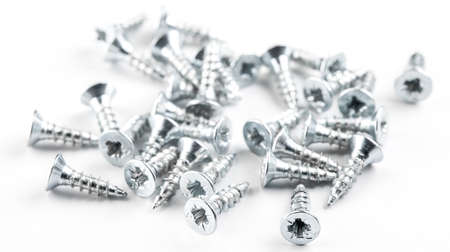 Self-tapping screws on a white backgroundの写真素材