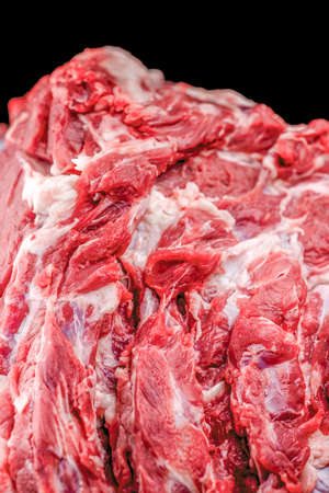 Raw meat on black backgroundの写真素材