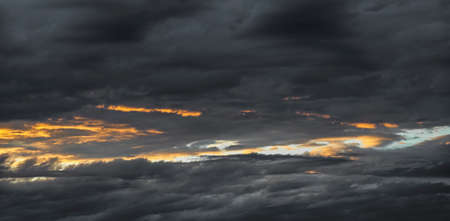 Sky with clouds at sunsetの写真素材