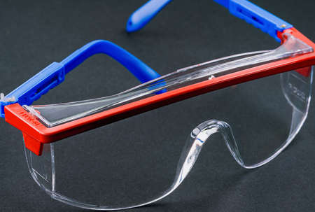 Safety construction goggles on black backgroundの写真素材