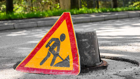 Traffic sign - Caution repair workの写真素材