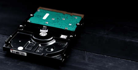 hard drive on wooden backgroundの写真素材