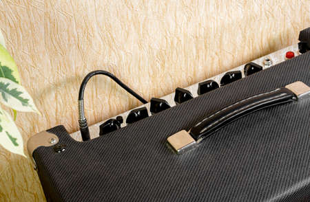 Guitar amplifier with cable connectedの写真素材