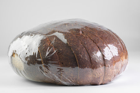 Black sliced ââbread isolated on white backgroundの写真素材