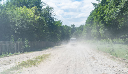 Dust in the air from a passing carの写真素材
