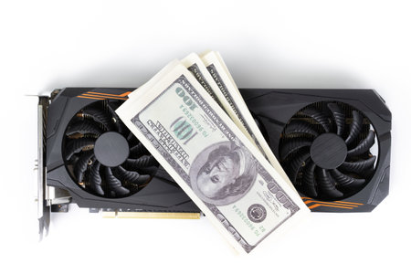 Buying a video card Video card and money on a white background