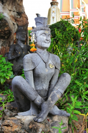 Hermit contortionist in wat pho of Thailandの写真素材
