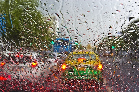 Raindrops on window  Blurred cityscape on a background 