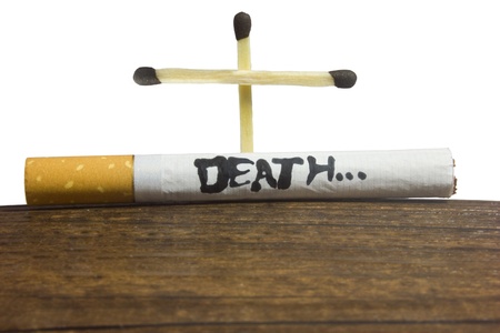 Cigarette with death written on it and cross of matchstickの写真素材