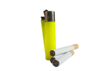 Closeup shot of cigarettes and lighter isolated on whiteの写真素材