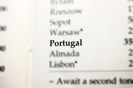 Close-up shot of Portugal word on paperの写真素材