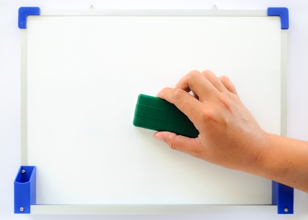 hand delete a whiteboard on white backgroundの写真素材