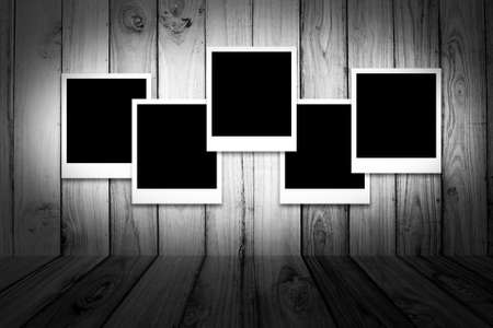 photoframe on wood background, black & whiteの写真素材