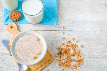 Breakfast, cereal and milk on the table.の写真素材