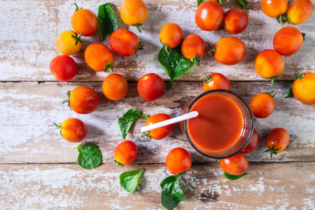 Fresh Tomato Juice with Tomato on Wooden Floorの写真素材