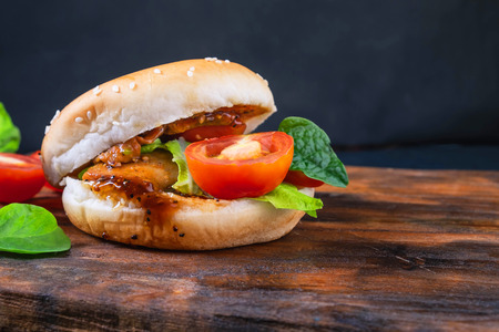 fresh tasty burger  on   wooden background