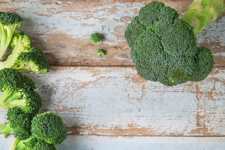 Fresh raw  broccoli on wooden backgroundの写真素材