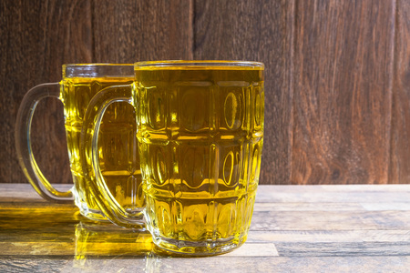 Beer Glass on the wooden Tableの写真素材