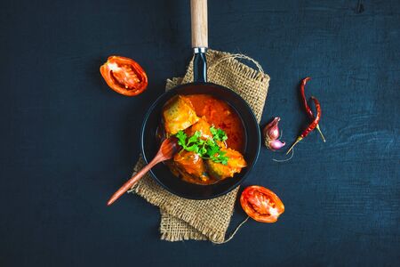 Fish with tomato sauce