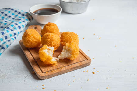Yellow delicious fried ball cheeseの写真素材