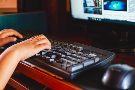 An office man sitting and working with a computer