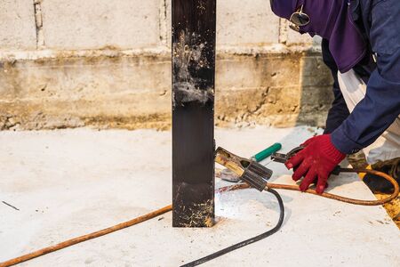 The welder is working on welding.
