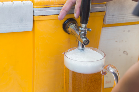 Draft beer dispenser in party or pubの写真素材