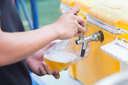 Draft beer dispenser in party or pubの写真素材