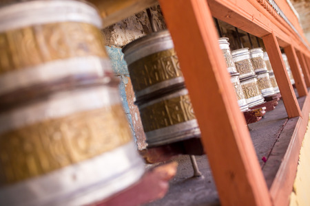 Religious prayer wheels in leh ladakhの写真素材