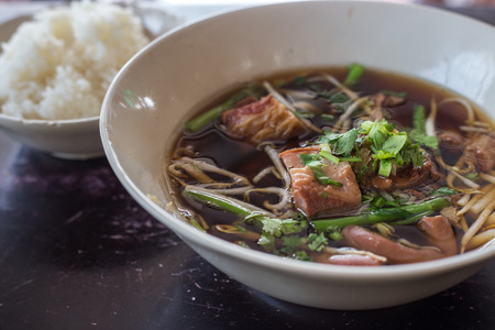 Thai cuisine Pork Stew Soup and cooked riceの写真素材