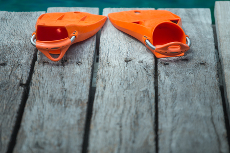 Orange flippers for divingの写真素材