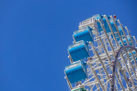 Tempozan ferris wheel at Tempozan harbor village next to Osaka Aquarium Kaiyukan.の写真素材