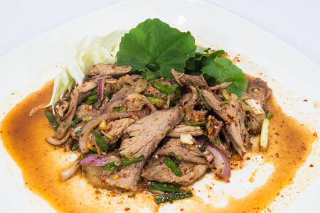 Spicy salad of roasted beef , Thai style cuisineの写真素材
