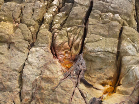 Brown stone with a rough surface and natural separationの写真素材