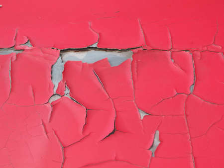 The surface of the red has cracks.の写真素材