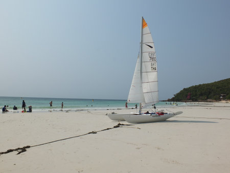 Koh Larn Pattaya,Thailand,March 21,2021 Photos of tourists coming to rest on vacation and admire the beauty of the sailing boats that are parked at Haad Tian.  Koh Larn Pattayaのeditorial素材