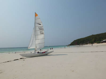 Koh Larn Pattaya,Thailand,March 21,2021 Photos of tourists coming to rest on vacation and admire the beauty of the sailing boats that are parked at Haad Tian.  Koh Larn Pattayaのeditorial素材