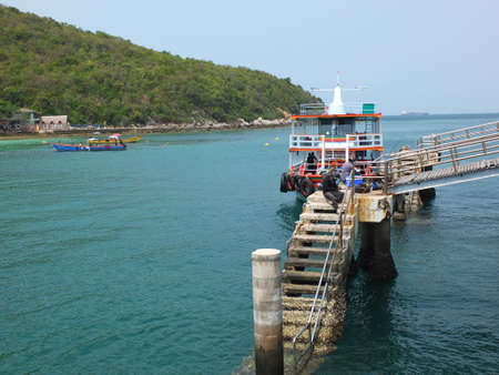 Koh Larn, Thailand March 21, 2021 is a picture of local fishermen fishing at the jettyのeditorial素材